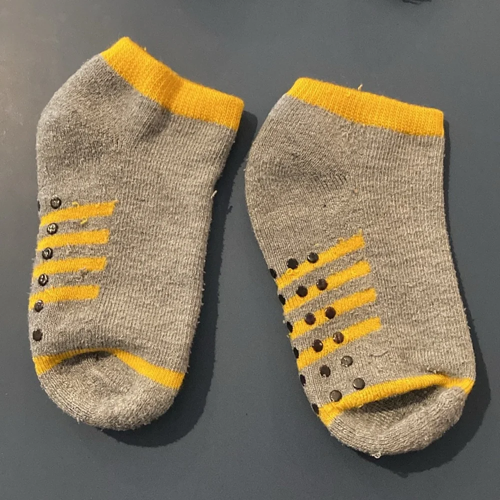Toddler Boys socks with feet. EUC. Blue,red, yellow, black. 4 pairs